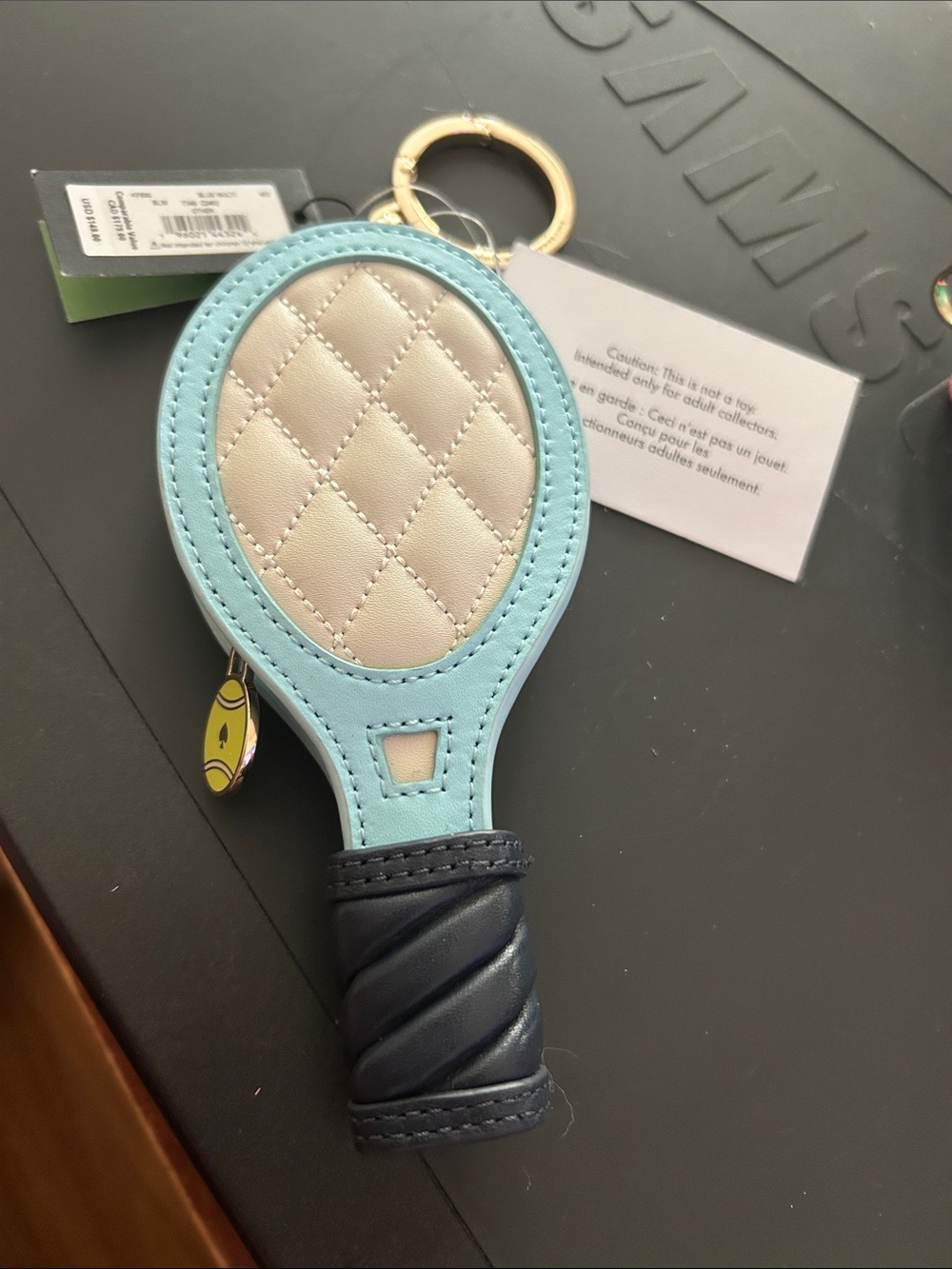 Kate spade Quirky tennis racket  Keychain in Light Blue & Cream